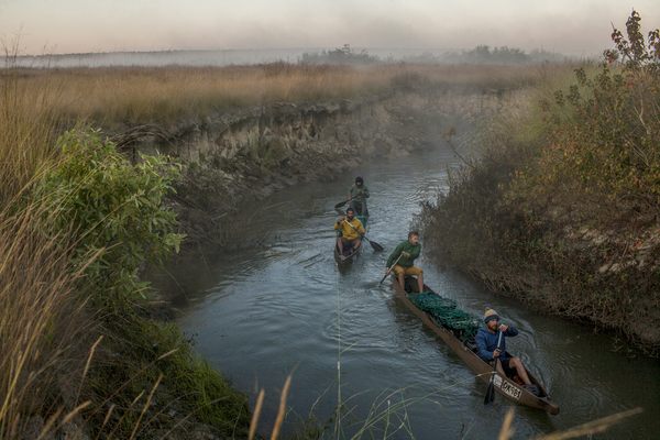 The river-based expedition team on the Cubango River. 