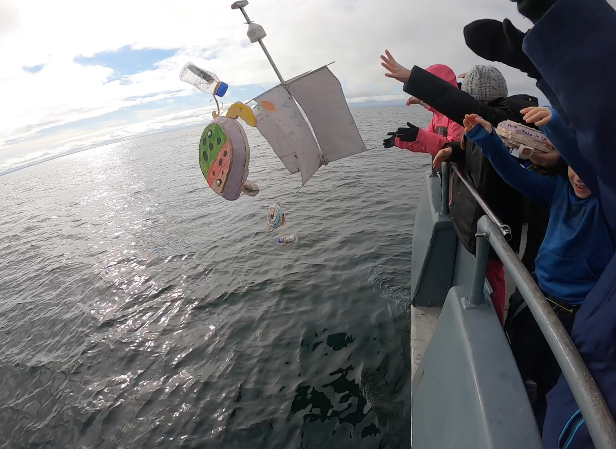 Students from Cape Cod Academy deploy their drifters.