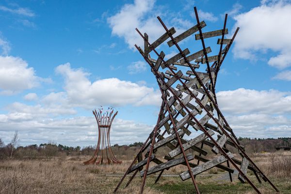 Two of Lough Boora Discovery Park’s tallest sculptures memorialize peat’s role as fuel.