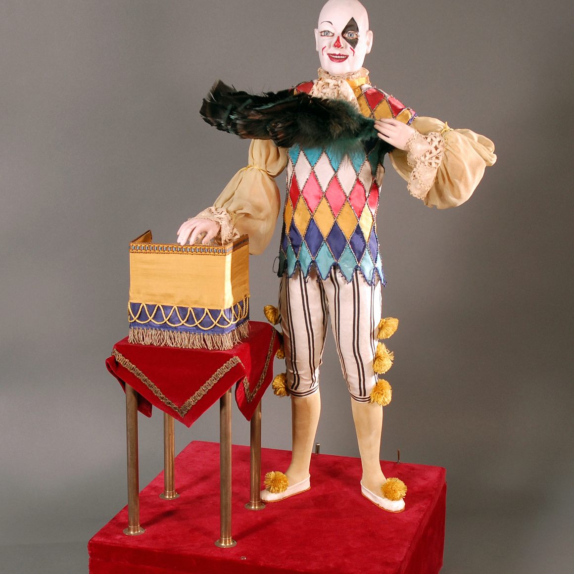 Clown Illusionist, automaton, c.1905   Jean or Edouard Henri Phalibois, Paris, France     34 1/2” h x 18” w x 15 3/4” d   2003.18.21ab 