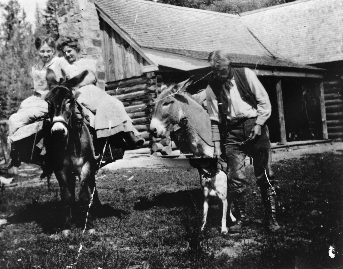 Uncle Jimmy Owens with Brighty the Burro, circa 1910.