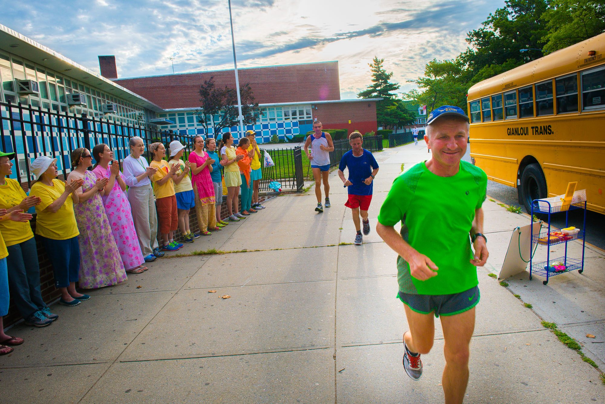 Runners get encouragement from spectators as they round the course in 2013.