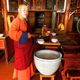 A monk serving fermented mare's milk in Mongolia.