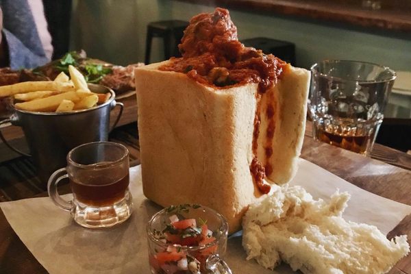 Conveniently, bunny chow is its own to-go bag. 
