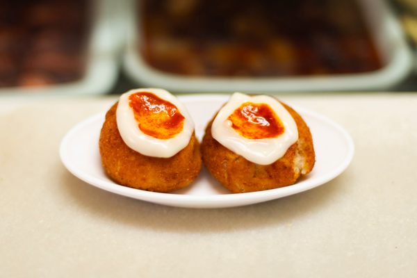 This “bomb” is really a deep-fried, golf ball-sized globe of mashed potatoes with a minced meat center.