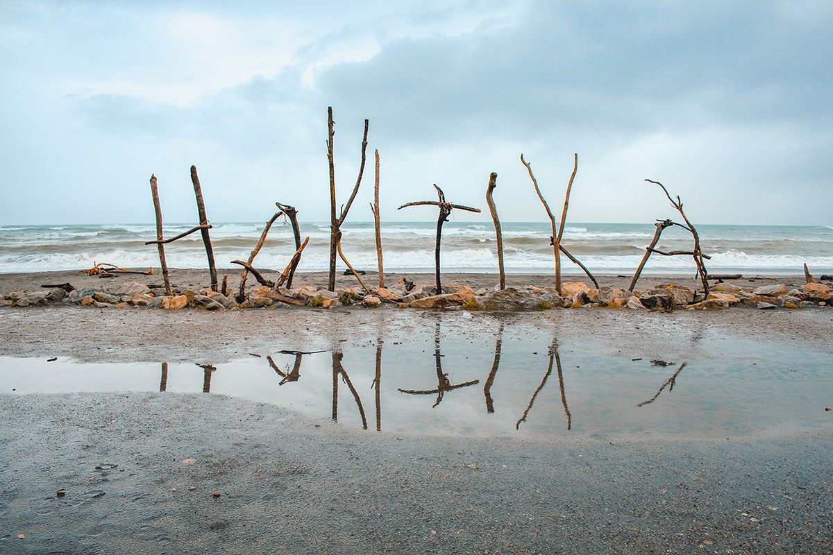 The town's driftwood sign has become a go-to photo spot. It was built by Don Neale, Sue Asplin's husband.
