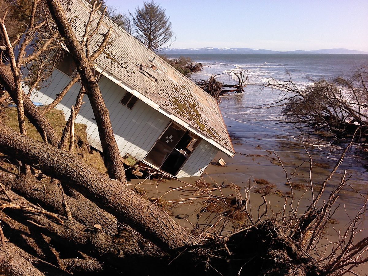 Over the last hundred years, erosion along North Cove's shore has claimed scores of buildings, including this home lost to the Pacific in 2011.