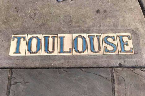 A street name in tiles in New Orleans' French Quarter.