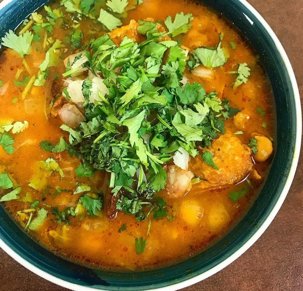 The Maharani soup is a fusion of garbanzo bean and yellow lentil soups, described as having a “symphony of flavors.”
