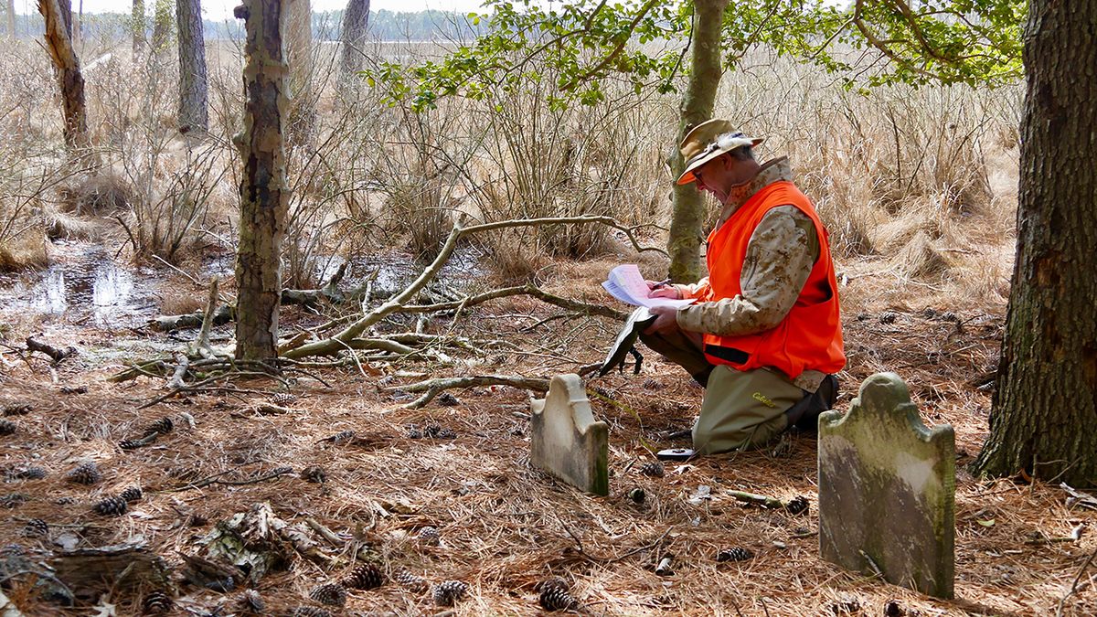 Joe Fehrer of The Nature Conservancy is studying a small family cemetery on Taylor’s Island, Maryland. He says, "We’re losing a lot of cultural history as these cemeteries—entire communities—go under water.”