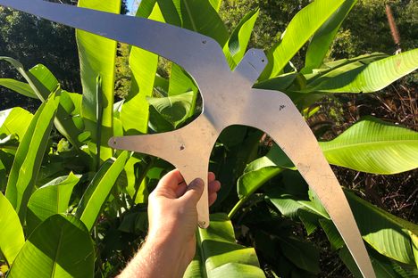 A bird in the hand: Part of the "Bayshore Drive Lighthouse" sculpture takes wing.