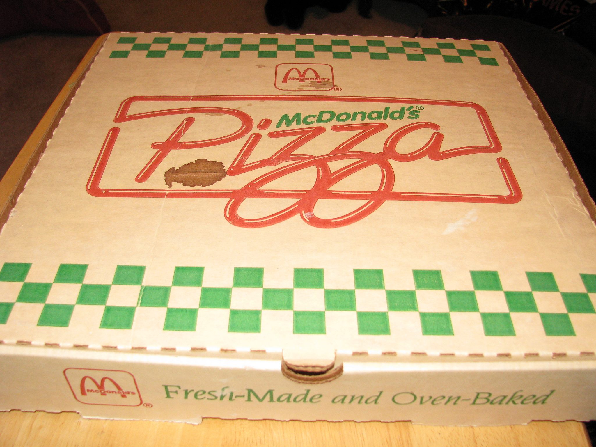 A genuine 1990s McDonald's Pizza box, complete with genuine grease stains.