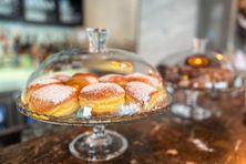 Krofi, an airy Slovenian doughnut, are one of the many treats for sale.
