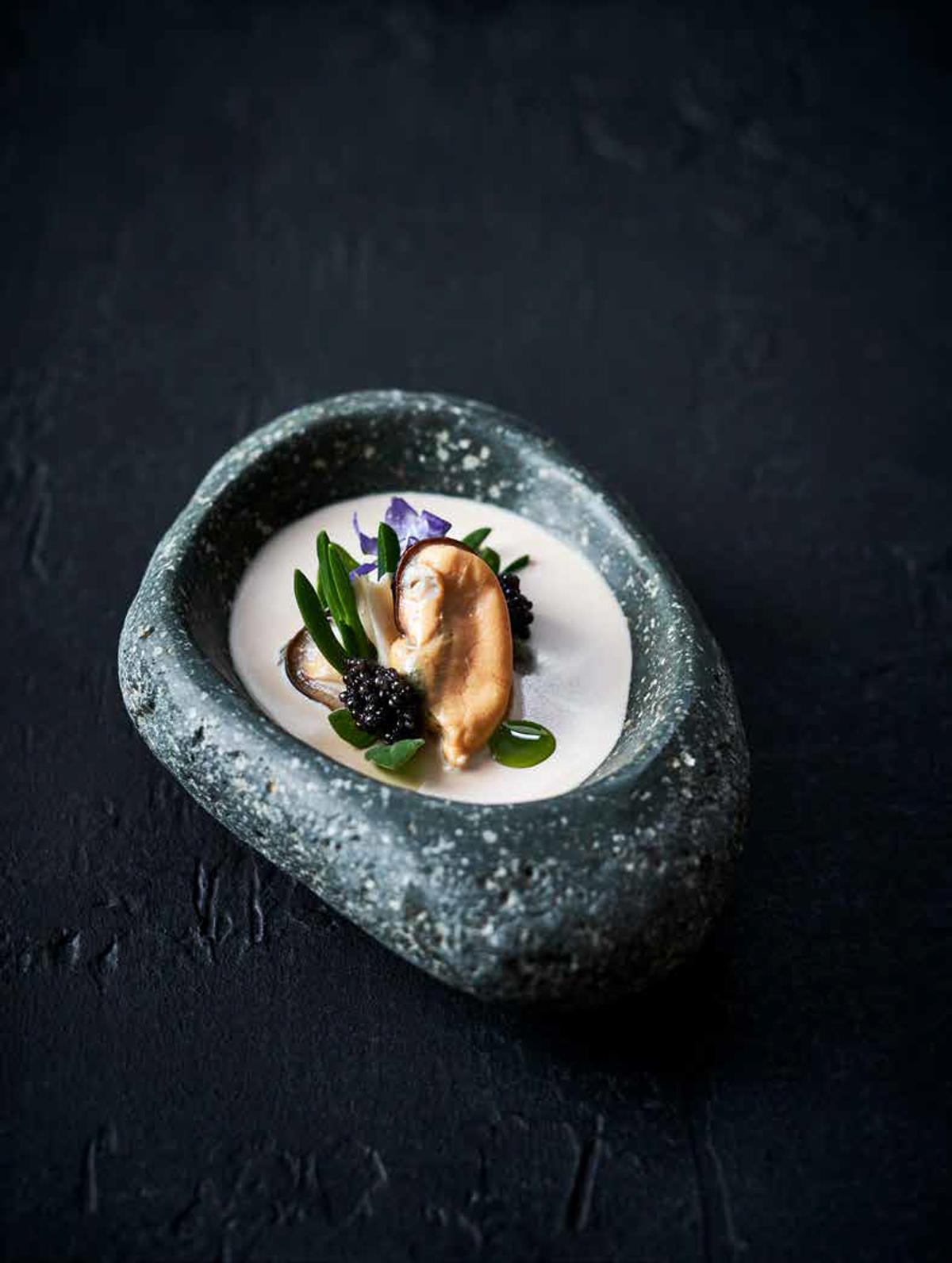 <em>Kina</em> (sea urchin) panna cotta with smoked <em>warehou</em> fish and <em>kuku</em>, or green-lipped mussels. 