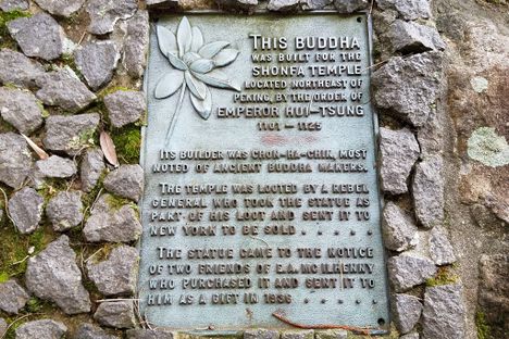 Informational plaque regarding the Buddha statue