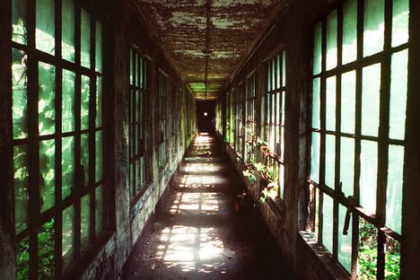 An abandoned corridor between buildings on Ellis Island. 