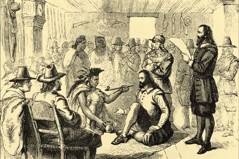 Massasoit, the leader of the Wampanoag, smokes a pipe with Plymouth Colony governor John Carver.
