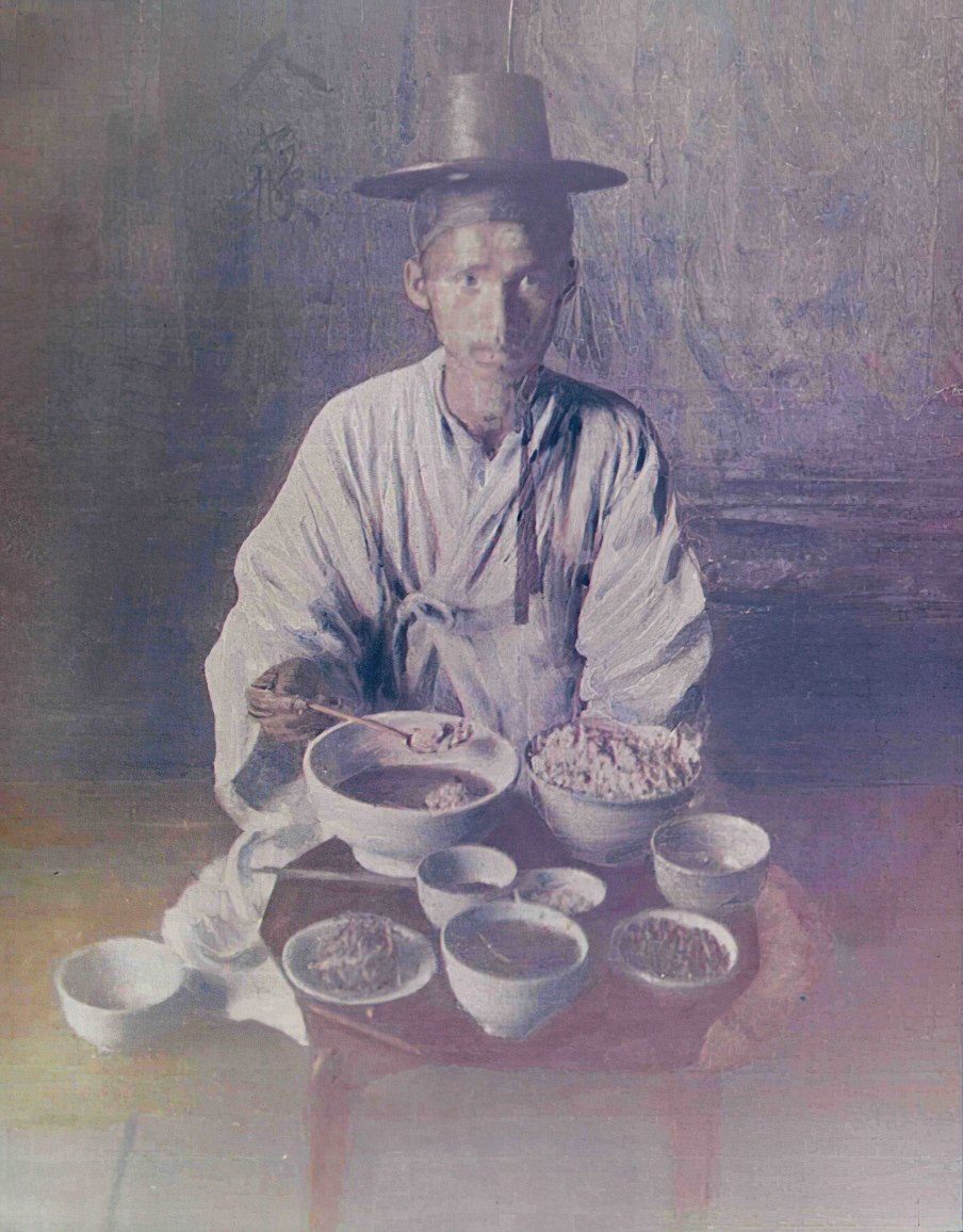 This photograph became a postcard in Europe, showing a massive meal.