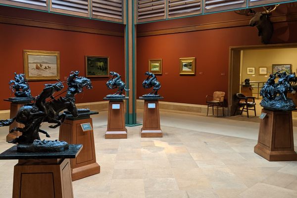 Hall featuring many of the Bronco Buster statues.