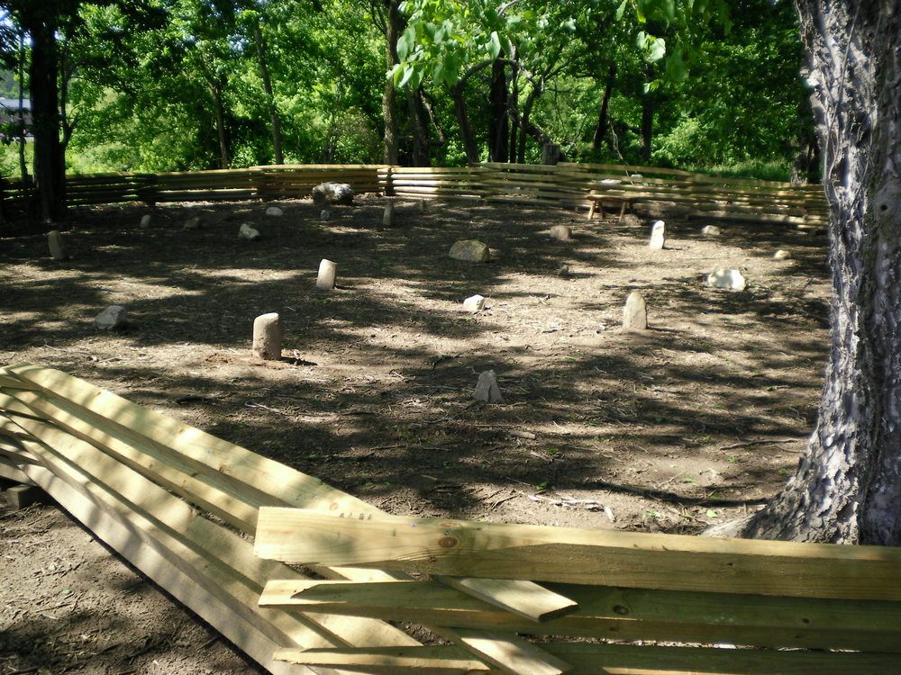The Enslaved Persons Cemetery, now fenced in, at Avoca. The headstones have been ordered in rows based on the data found by the geophysicist. This is likely what the cemetery would have looked like before the rocks were moved over the years.