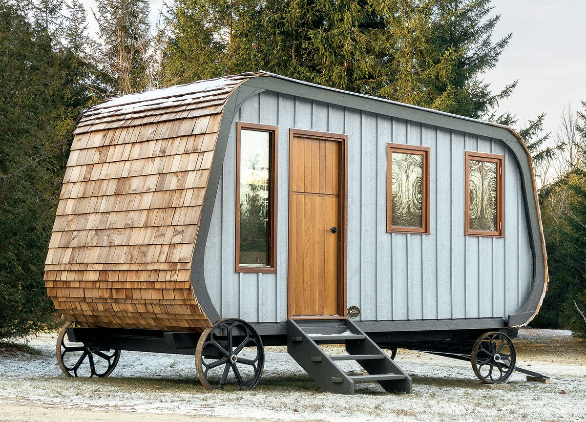 The interior of the fifteen-foot, hand-made Collingwood Shepherd Hut wagon includes bunk beds and a wood-burning stove. (Güte, Canada, 2015)
