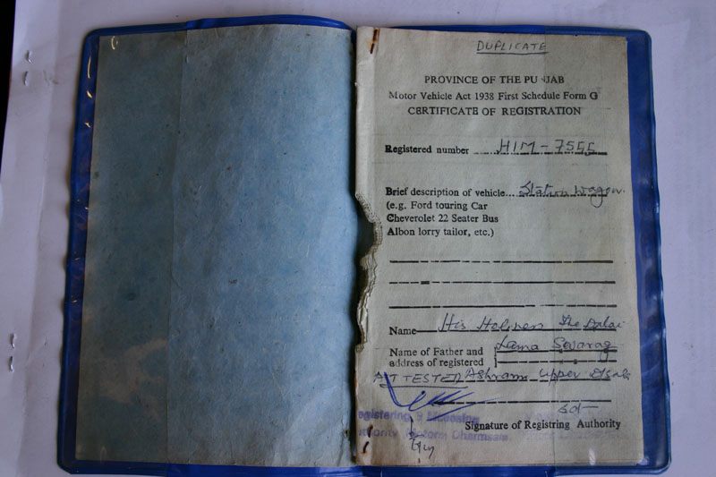 The Land Rover's original paperwork (insurance not included).