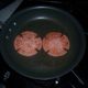 Cutting four notches in each pork roll slice prevents curling that may happen during frying.