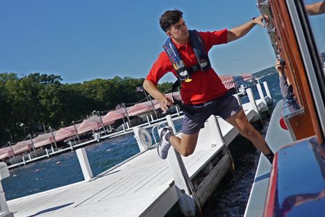 Sid Pearl jumps safely back to the boat—but that's not always what happens. Pearl has fallen in the lake eight times in two years.