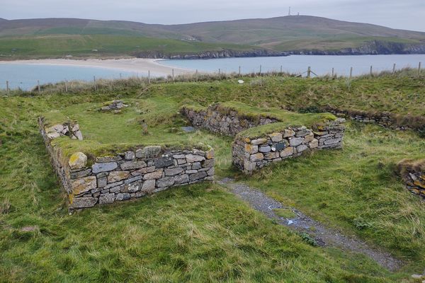 Chapel ruins and tombolo in the background.