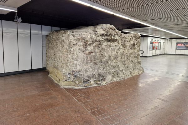 One of the sections of the old city walls in the entrance to the metro.