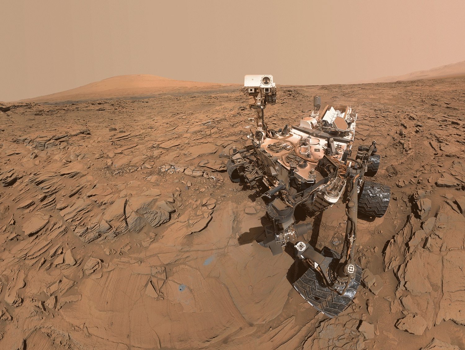 A self-portrait of the Curiosity rover, as a mosaic that removes the robotic arm holding the camera.