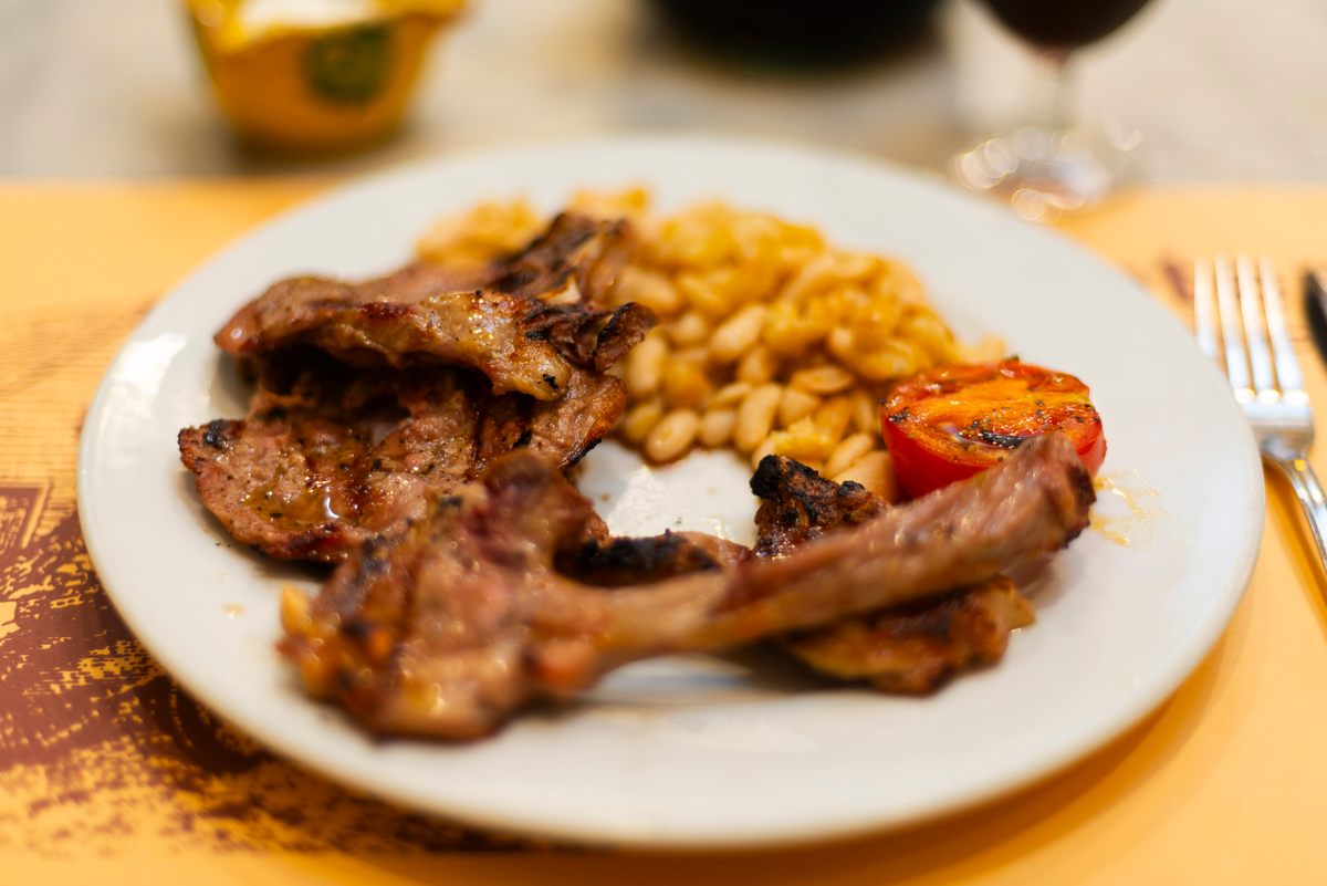 “Fork breakfasts,” like this plate of grilled lamb chops and beans at Cal Boter, are hard to find these days.
