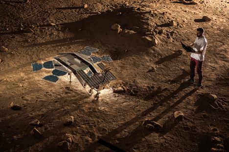 A mockup of the ExoMars rover rolls off its landing platform at the Rover Operational Control Centre near Turin, Italy. The facility is designed to simulate what conditions will be like on Mars when the actual rover, named Rosalind Franklin, arrives in 2022. 