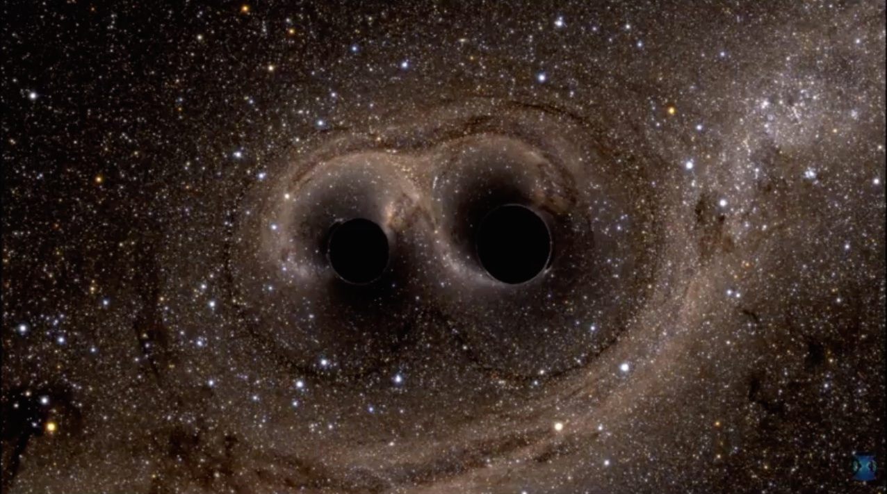 A computer simulation of the two colliding black holes that spawned the first gravitational waves ever detected.