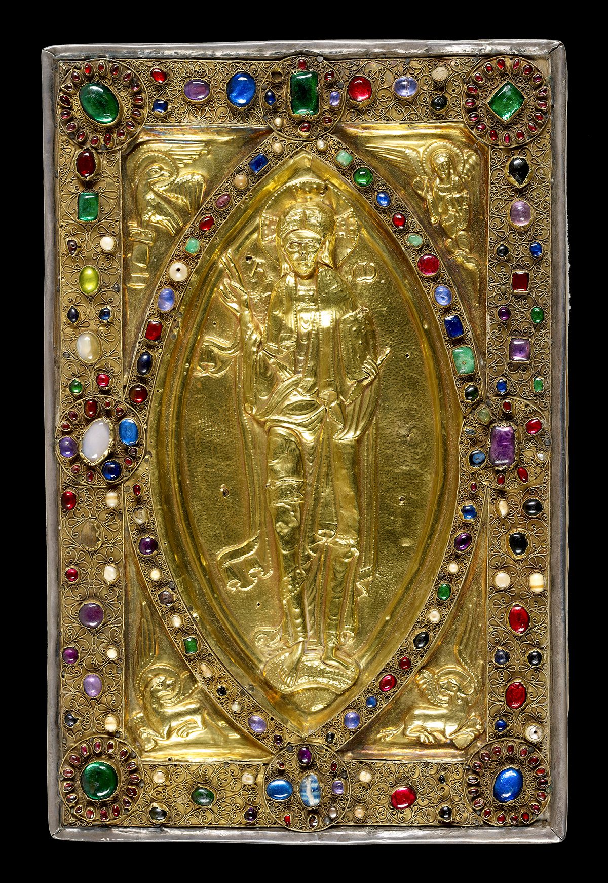 Jeweled cover with silver-gilt repoussé figures, <em>Gospels of Judith of Flanders</em>, c. 1060.