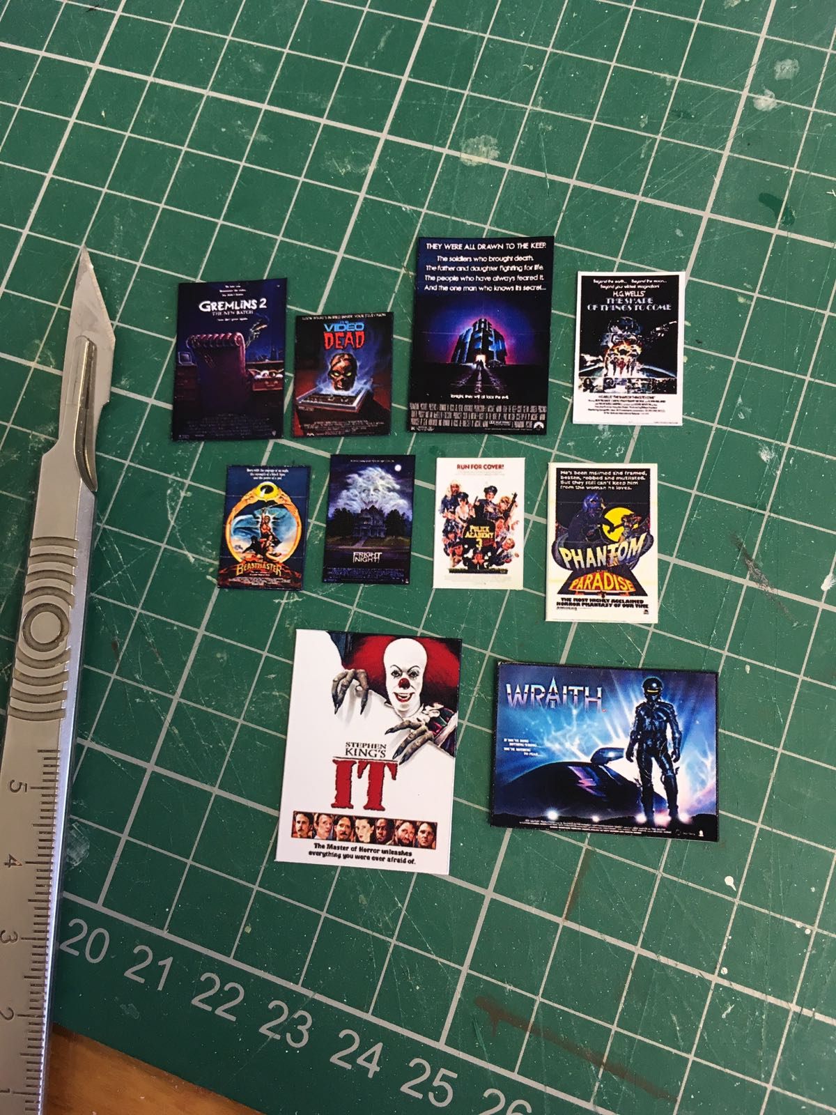 Itty-bitty video covers, carefully cut.