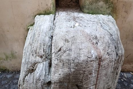 The base of the column with its deep gash