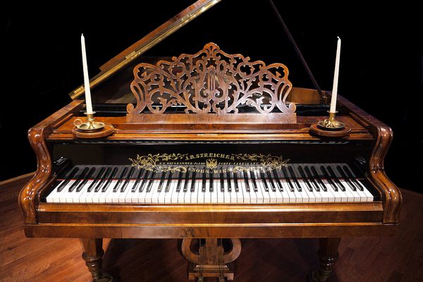 Streicher 1869 Grand Piano on display in the museum.