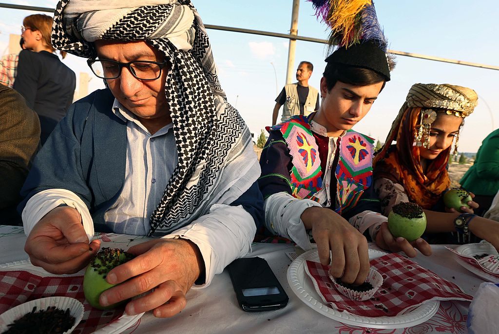 In 2014, Kurds gathered outside the United Nations (UN) offices in the city of Erbil, Iraq to decorate clove apples.
