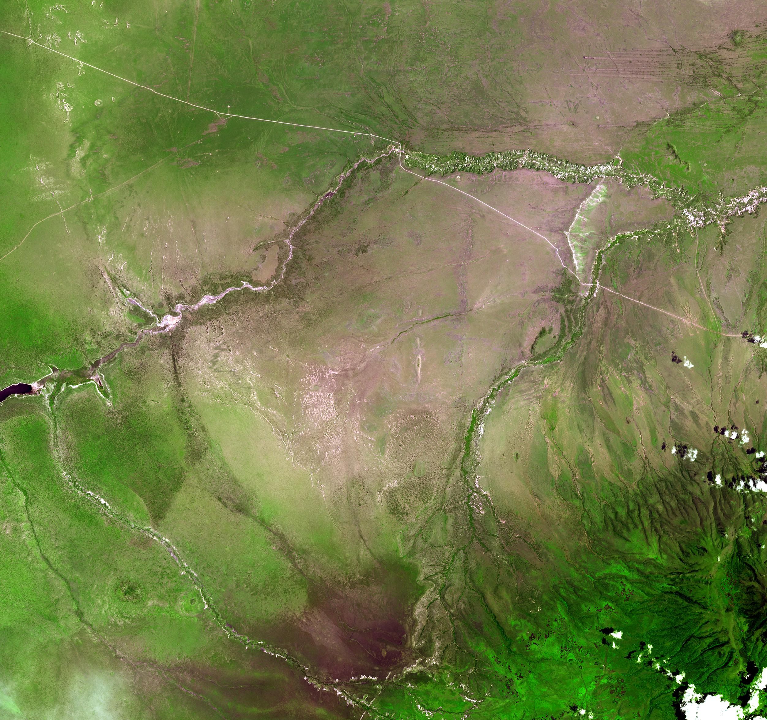 Now an arid strip of East Africa, Olduvai Gorge seems to have hosted both humans and hot springs.