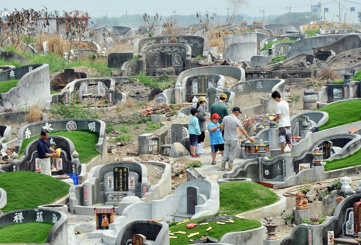 Local residents pay respects to their ancestors in Pingtung, southern Taiwan, in the lead-up to Tomb Sweeping Day.