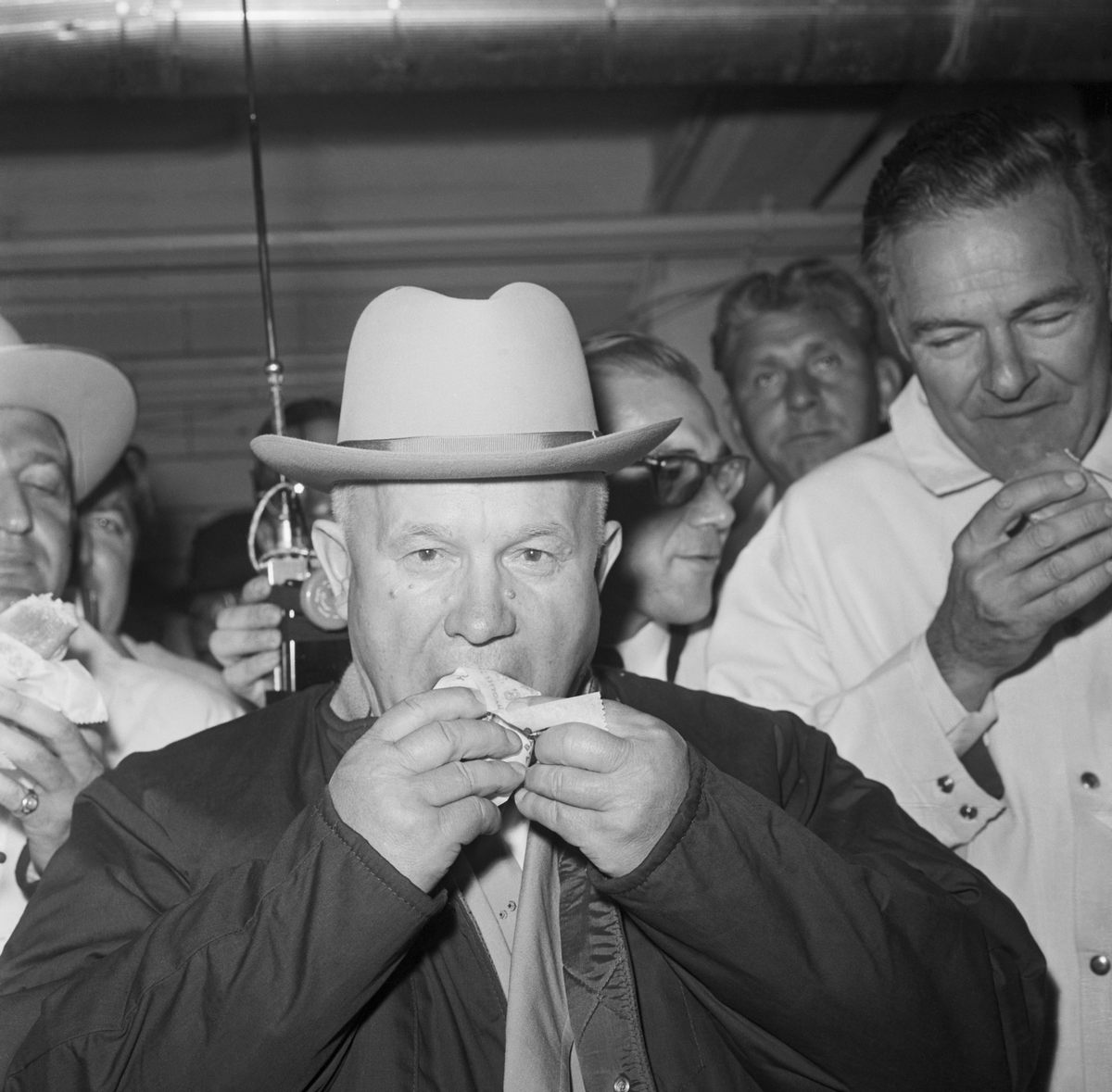 Soviet Premier Nikita Khrushchev tastes his first American hot dog in Iowa in 1959