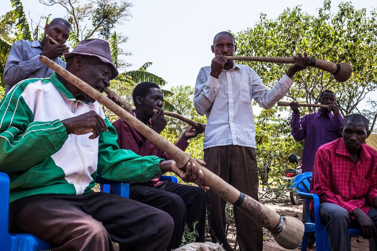 James Lugolole (left) plays with other trained Bigwala musicians.