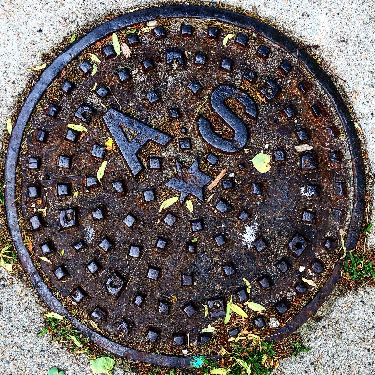 Many of the manhole covers in Arlington are decorated with a six-pointed star.