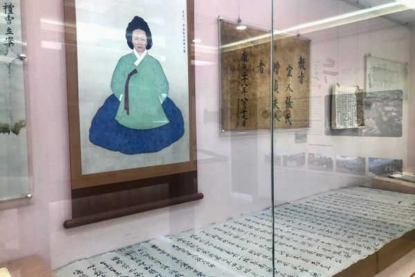 A portrait of Jang Gye-hyang hangs in the Eumsik-Dimibang Exhibition Center.