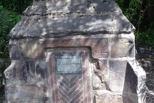 The bricked up doorway on the south side of the wellhead 