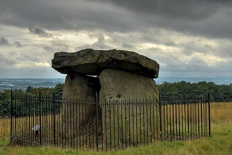 Kit's Coty with backdrop of storm clouds gathering.