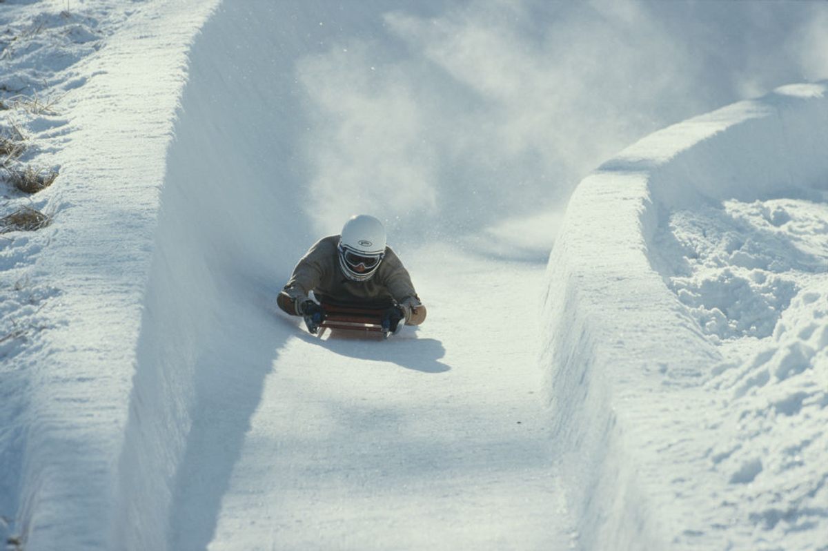 The Cresta Run has gotten faster over the years. Here, in 1995, a skeleton rider races down head-first.