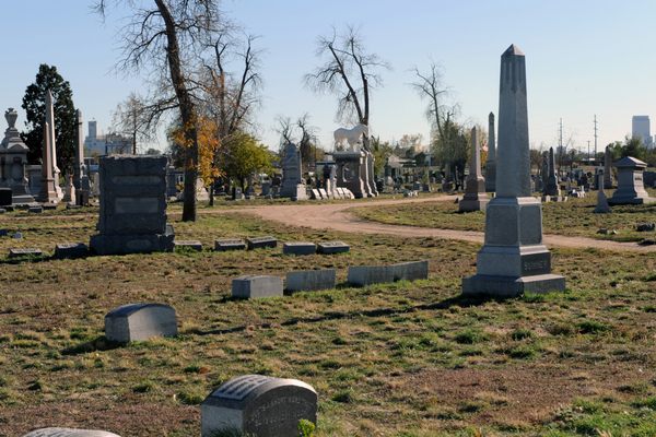 Statues and headstones mark the final resting place of Denver's early pioneers.