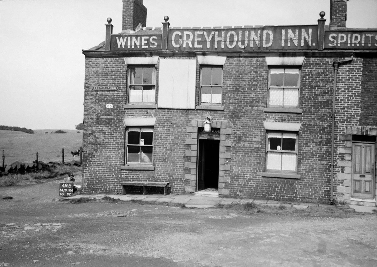 The Greyhound Inn in 1949. See if you can spot the survey worker.